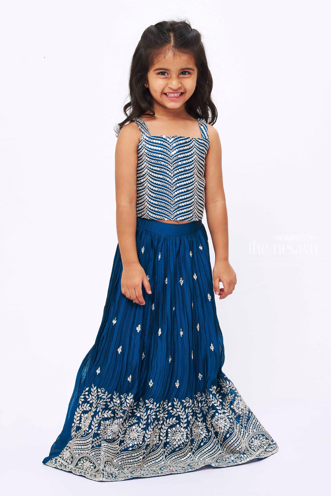 The Nesavu Girls Lehenga Choli Teal Blue Sequin Embroidered Lehenga Set with Crop Top, Detachable Sleeves, and Dupatta for Girls Nesavu Girls Teal Blue Embroidered Lehenga Crop Top | Traditional Wear with Modern Twist