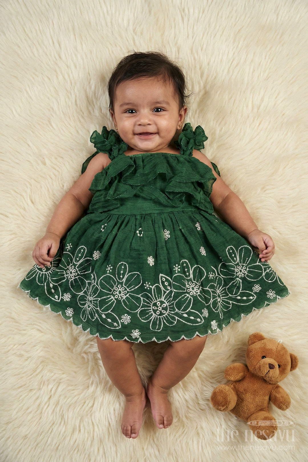 The Nesavu Girls Shorts Temple Visit Baby Frock in Traditional Green with Soft Cotton Fabric and Intricate Floral Lace Accents Nesavu Nesavu traditional green baby cotton frock floral lace temple visits cultural celebrations
