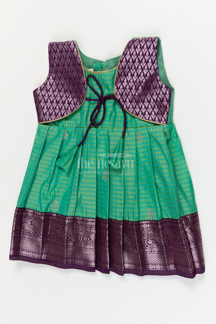 The Nesavu Girls Kanchi Silk Frock Temple Wear Silk Frock for Toddler Girls with Kanchivaram Saree Inspired Zari Border Nesavu 10 (NB) / Green / style 1 KSF015BA-10 Nesavu toddler girl temple wear silk frock with Kanchivaram style zari borders and contrast jacquard yoke
