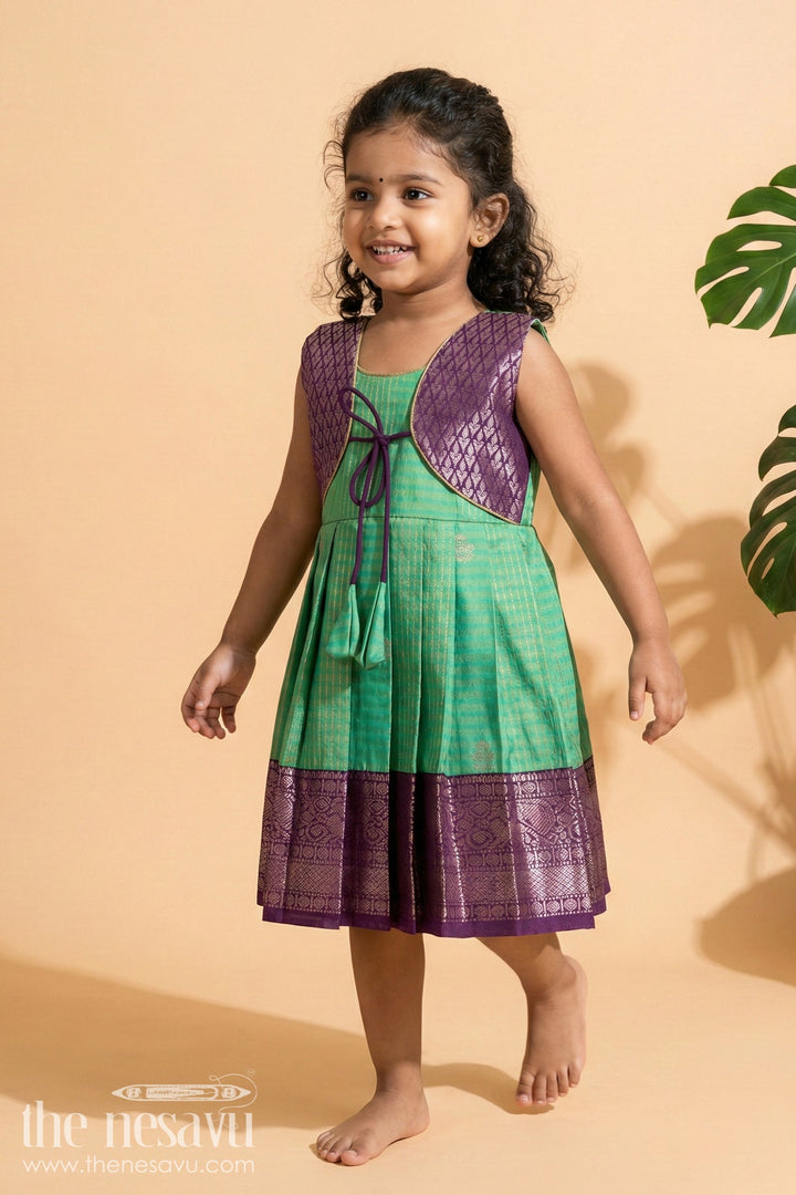 The Nesavu Girls Kanchi Silk Frock Temple Wear Silk Frock for Toddler Girls with Kanchivaram Saree Inspired Zari Border Nesavu 10 (NB) / Green / style 1 KSF015BA-10 Nesavu toddler girl temple wear silk frock with Kanchivaram style zari borders and contrast jacquard yoke