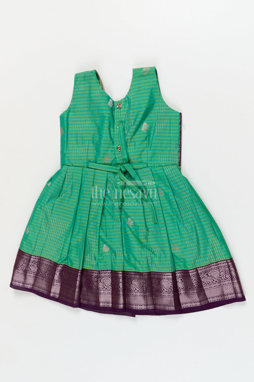 The Nesavu Girls Kanchi Silk Frock Temple Wear Silk Frock for Toddler Girls with Kanchivaram Saree Inspired Zari Border Nesavu Nesavu toddler girl temple wear silk frock with Kanchivaram style zari borders and contrast jacquard yoke
