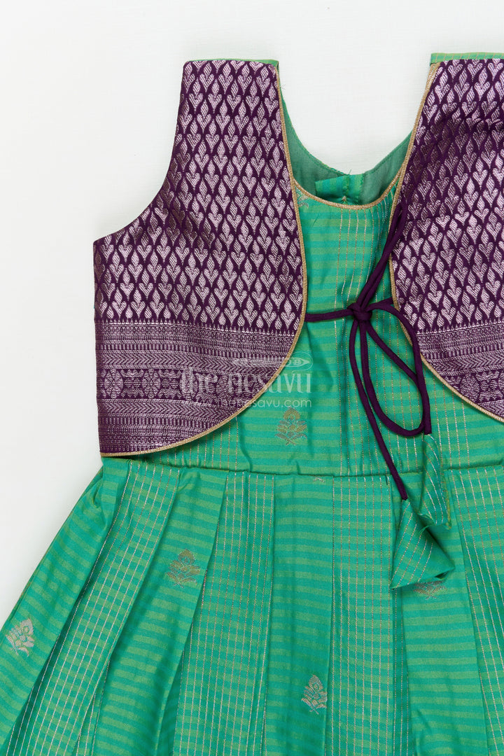 The Nesavu Girls Kanchi Silk Frock Temple Wear Silk Frock for Toddler Girls with Kanchivaram Saree Inspired Zari Border Nesavu Nesavu toddler girl temple wear silk frock with Kanchivaram style zari borders and contrast jacquard yoke