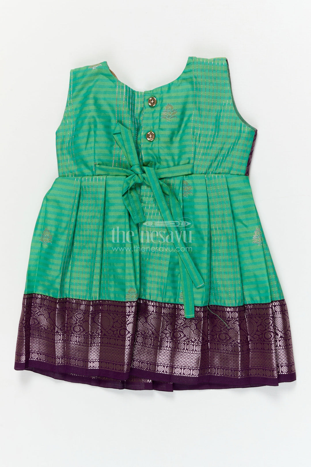 The Nesavu Girls Kanchi Silk Frock Temple Wear Silk Frock for Toddler Girls with Kanchivaram Saree Inspired Zari Border Nesavu Nesavu toddler girl temple wear silk frock with Kanchivaram style zari borders and contrast jacquard yoke