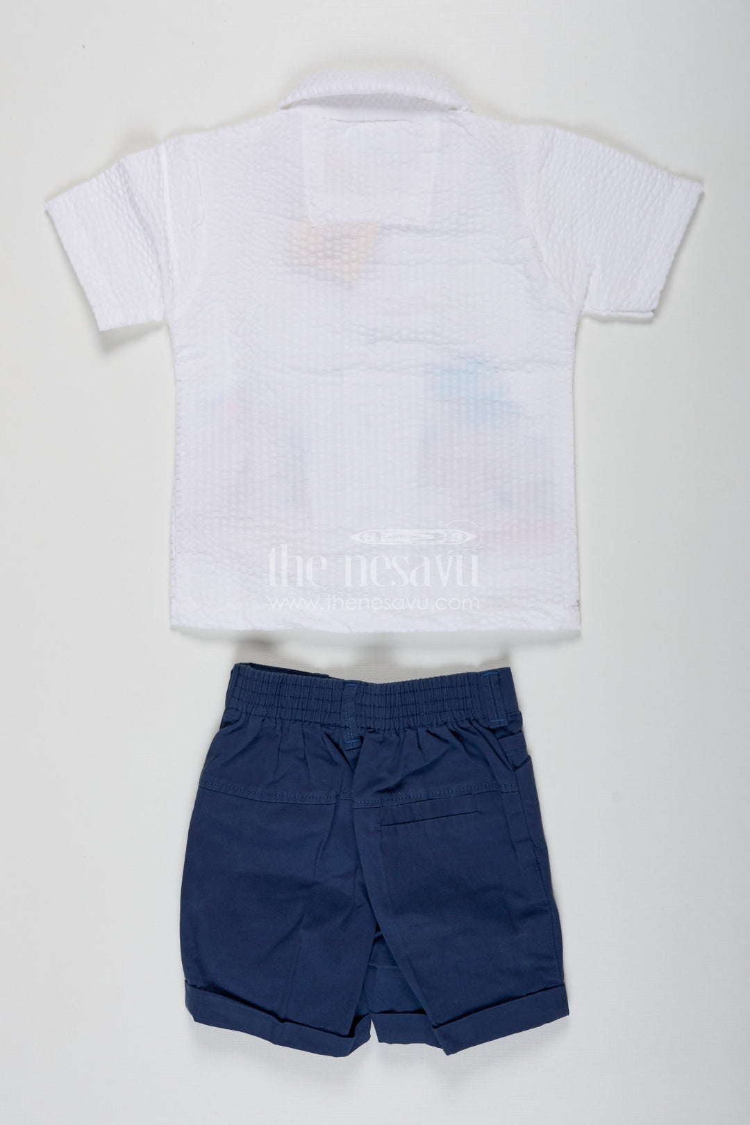 The Nesavu Boys Casual Set Thread Embroidery Boys Casual Shirt Set with Beach Scene Motif and Navy Blue Shorts in Crush Cotton Blend Nesavu Thread Embroidery Boys Shirt Set with Beach Motif in Crush Cotton and Navy Blue Shorts | The Nesavu
