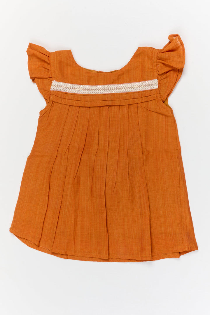 The Nesavu Girls Chanderi Frock Toddler Girl Festive Chanderi Frock with Embroidered Yoke for Casual Functions Nesavu 10 (NB) / Gold / Chanderi GFC2096A-10 Nesavu toddler girl chanderi cotton frock with lace yoke for poojas and traditional daywear