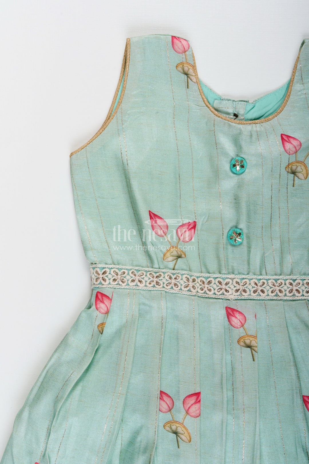 The Nesavu Silk Frock Toddler girl semi silk frock for weddings and cultural events Nesavu Nesavu pastel green semi silk frock toddler girls zari border floral accents