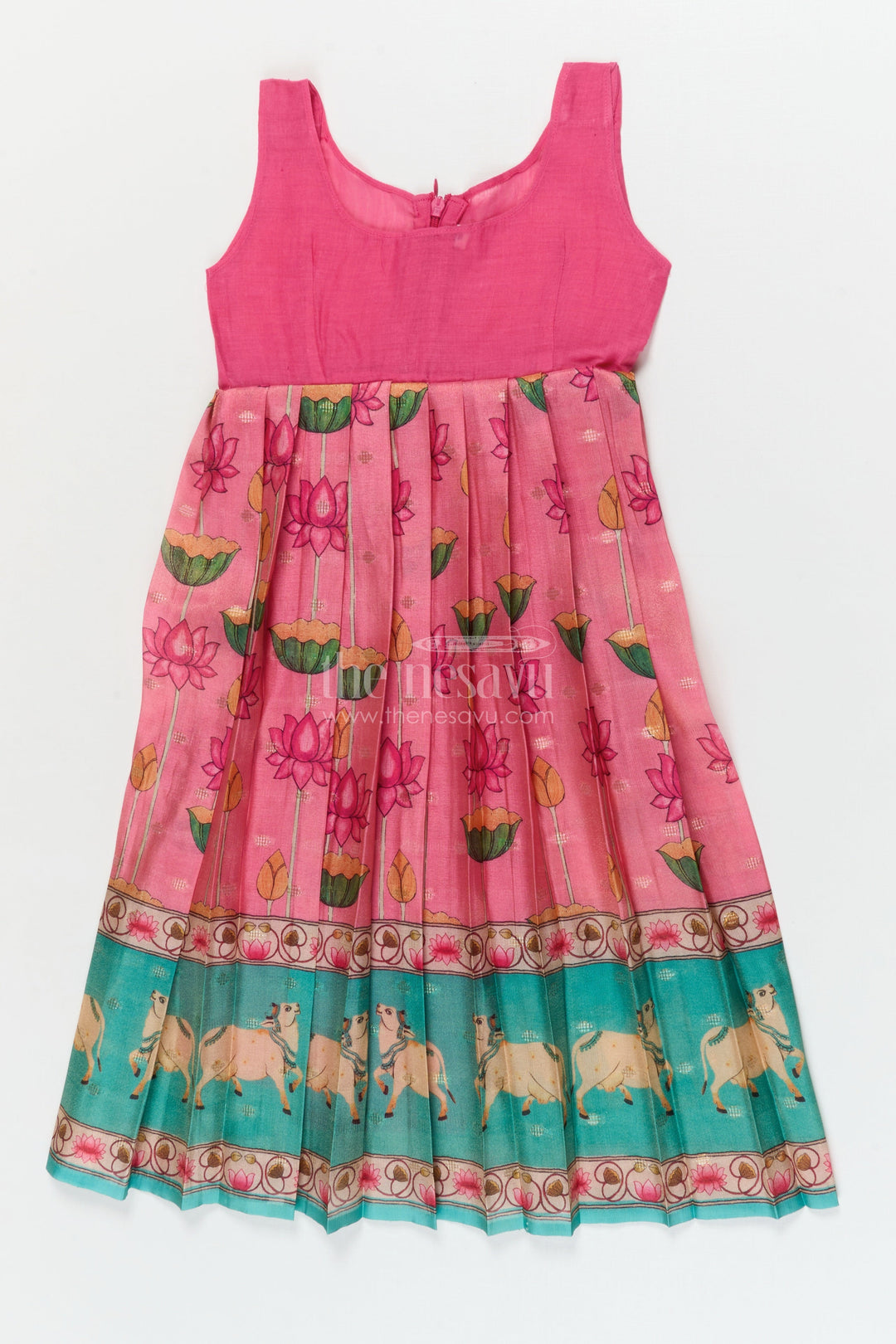 The Nesavu Pattu Pavadai Traditional Baby Pattu Pavadai with Cow and Lotus Print for Ethnic Functions Nesavu Nesavu baby girl pattu pavadai with cow border and lotus skirt for traditional pooja wear