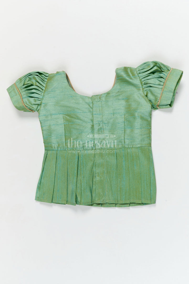 The Nesavu Pattu Pavadai Traditional Baby Pattu Pavadai with Cow and Lotus Print for Ethnic Functions Nesavu Nesavu baby girl pattu pavadai with cow border and lotus skirt for traditional pooja wear