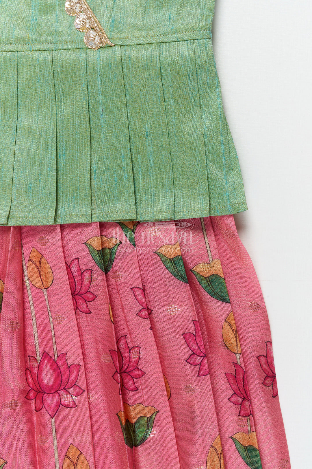 The Nesavu Pattu Pavadai Traditional Baby Pattu Pavadai with Cow and Lotus Print for Ethnic Functions Nesavu Nesavu baby girl pattu pavadai with cow border and lotus skirt for traditional pooja wear