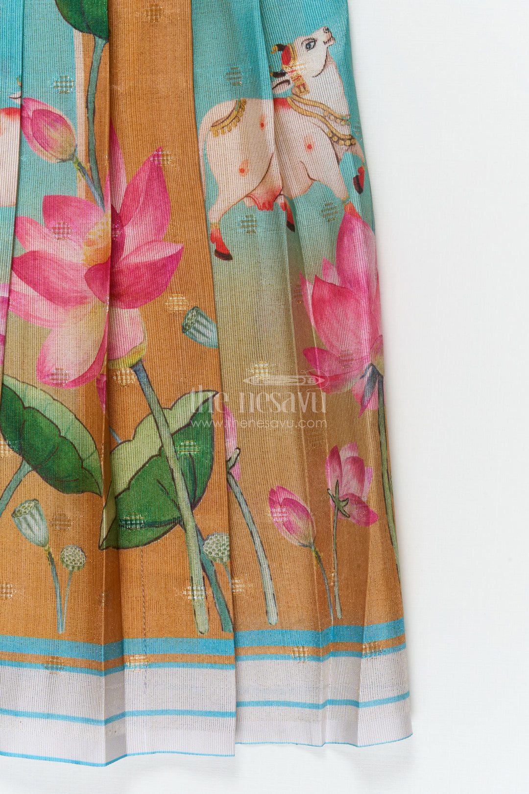 The Nesavu Pattu Pavadai Traditional Baby Pattu Pavadai with Lotus Print Skirt for Festive Photoshoots Nesavu Nesavu baby pattu pavadai with lotus print skirt and scallop blouse for festive occasions