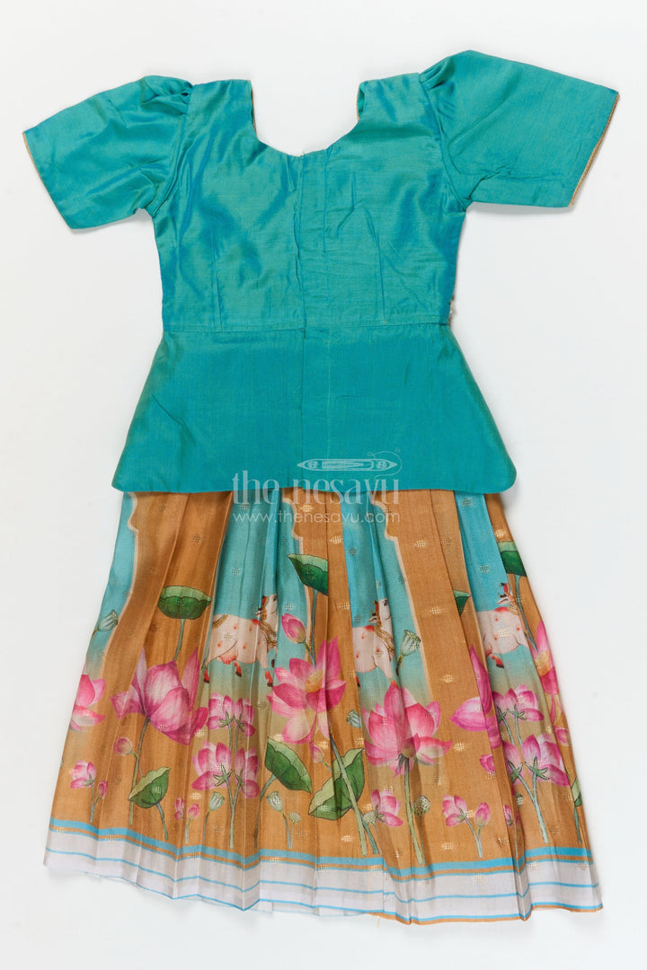 The Nesavu Pattu Pavadai Traditional Baby Pattu Pavadai with Lotus Print Skirt for Festive Photoshoots Nesavu Nesavu baby pattu pavadai with lotus print skirt and scallop blouse for festive occasions