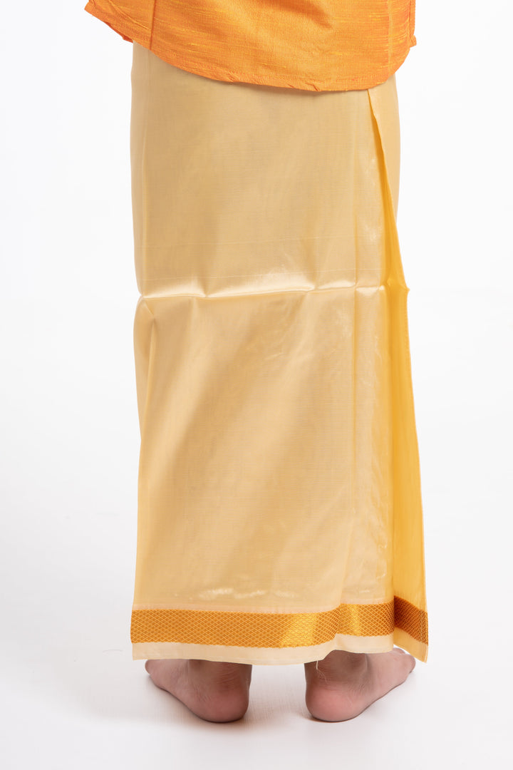 The Nesavu Boys Vesti Traditional Golden Silk Dhoti for Boys with Elegant Border Detailing Nesavu Elegant Golden Silk Dhoti for Boys | The Nesavu
