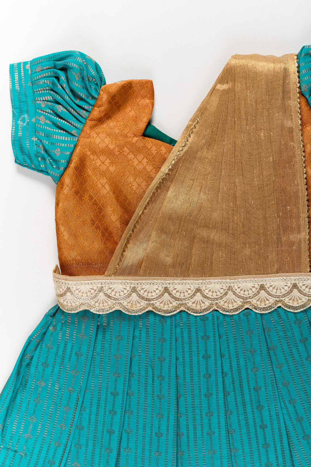 The Nesavu Girls Kanchi Silk Frock Traditional Green and Gold Pattu Pavadai for Girls with Intricate Zari Borders Nesavu Traditional Green Gold Pattu Pavadai Girls Zari Borders | The Nesavu