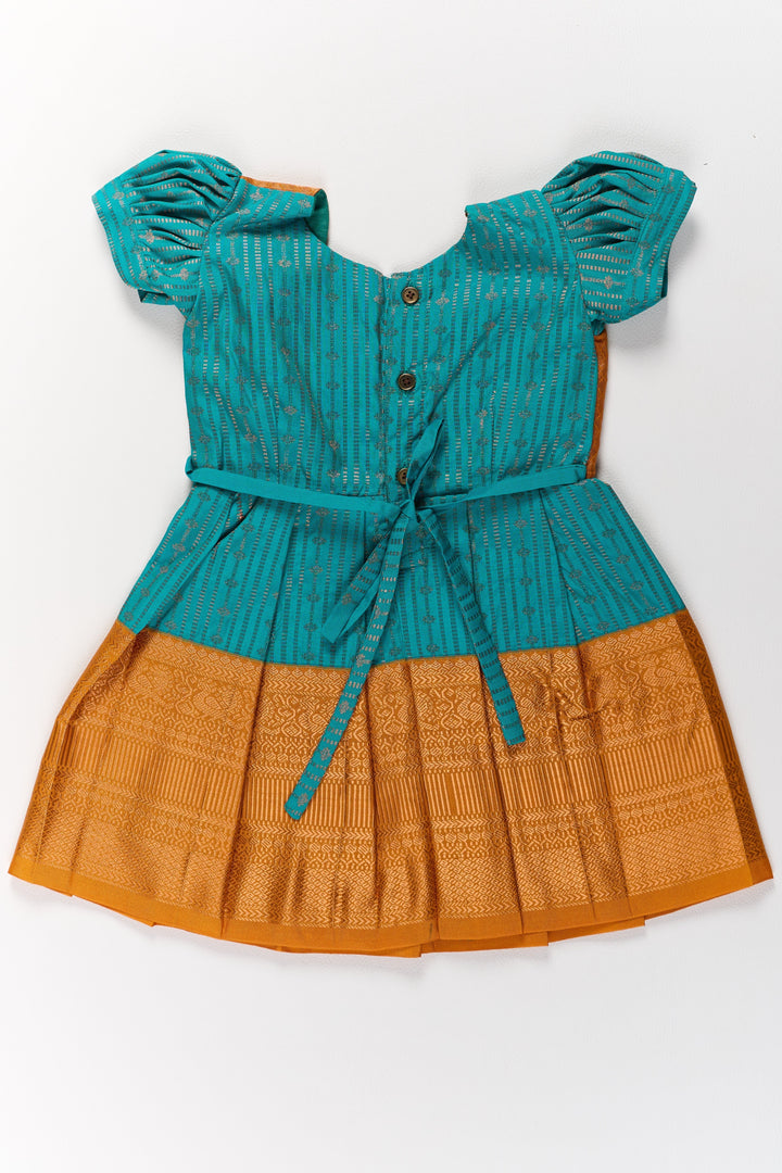 The Nesavu Girls Kanchi Silk Frock Traditional Green and Gold Pattu Pavadai for Girls with Intricate Zari Borders Nesavu Traditional Green Gold Pattu Pavadai Girls Zari Borders | The Nesavu
