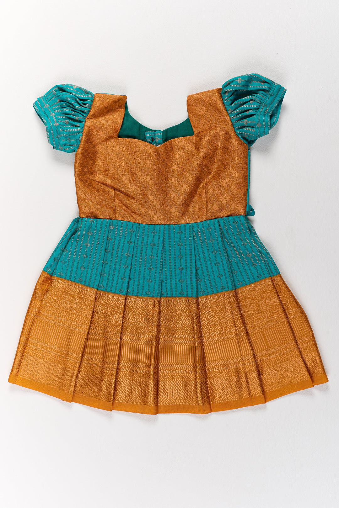 The Nesavu Girls Kanchi Silk Frock Traditional Green and Gold Pattu Pavadai for Girls with Intricate Zari Borders Nesavu Traditional Green Gold Pattu Pavadai Girls Zari Borders | The Nesavu