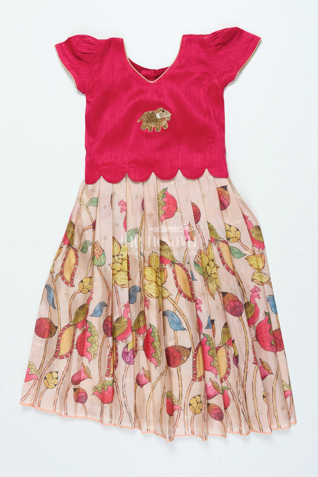 The Nesavu Pattu Pavadai Traditional Pattu Pavadai for Baby Girls for Festive Wear and Gifting Nesavu Nesavu baby girl traditional pattu pavadai lotus motif skirt puff sleeve blouse