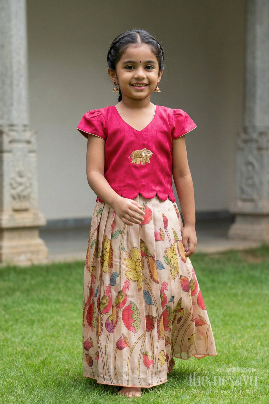 The Nesavu Pattu Pavadai Traditional Pattu Pavadai for Baby Girls for Festive Wear and Gifting Nesavu Nesavu baby girl traditional pattu pavadai lotus motif skirt puff sleeve blouse