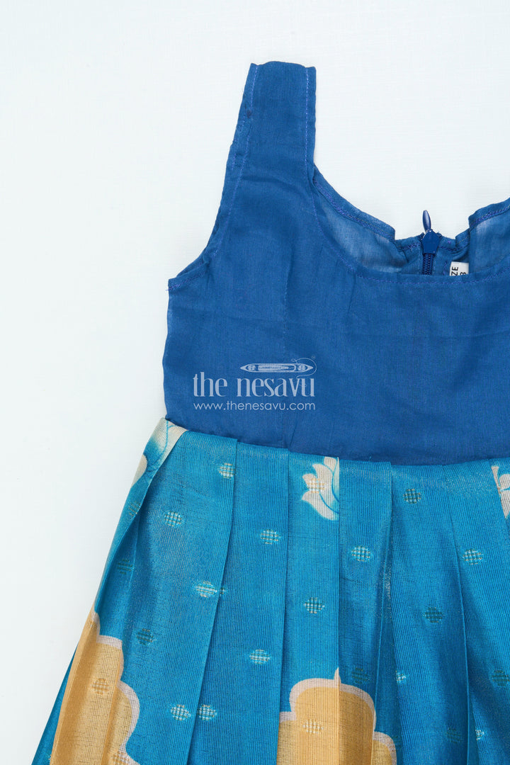 The Nesavu Pattu Pavadai Traditional Pattu Pavadai for Baby Girls for Temple and Cultural Events Nesavu Nesavu baby girl pattu pavadai Krishna print skirt scalloped sleeve blouse festive wear