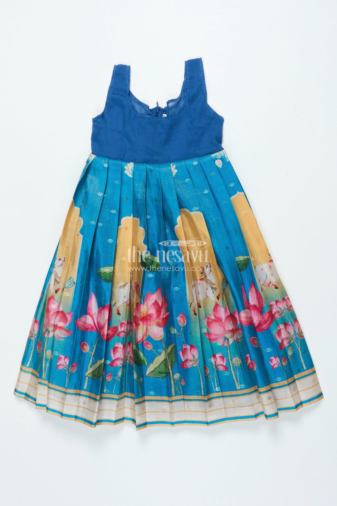 The Nesavu Pattu Pavadai Traditional Pattu Pavadai for Baby Girls for Temple and Cultural Events Nesavu Nesavu baby girl pattu pavadai Krishna print skirt scalloped sleeve blouse festive wear