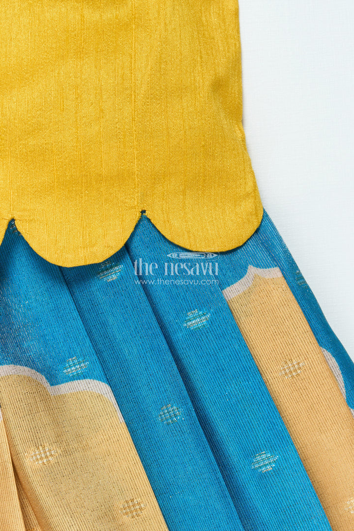 The Nesavu Pattu Pavadai Traditional Pattu Pavadai for Baby Girls for Temple and Cultural Events Nesavu Nesavu baby girl pattu pavadai Krishna print skirt scalloped sleeve blouse festive wear