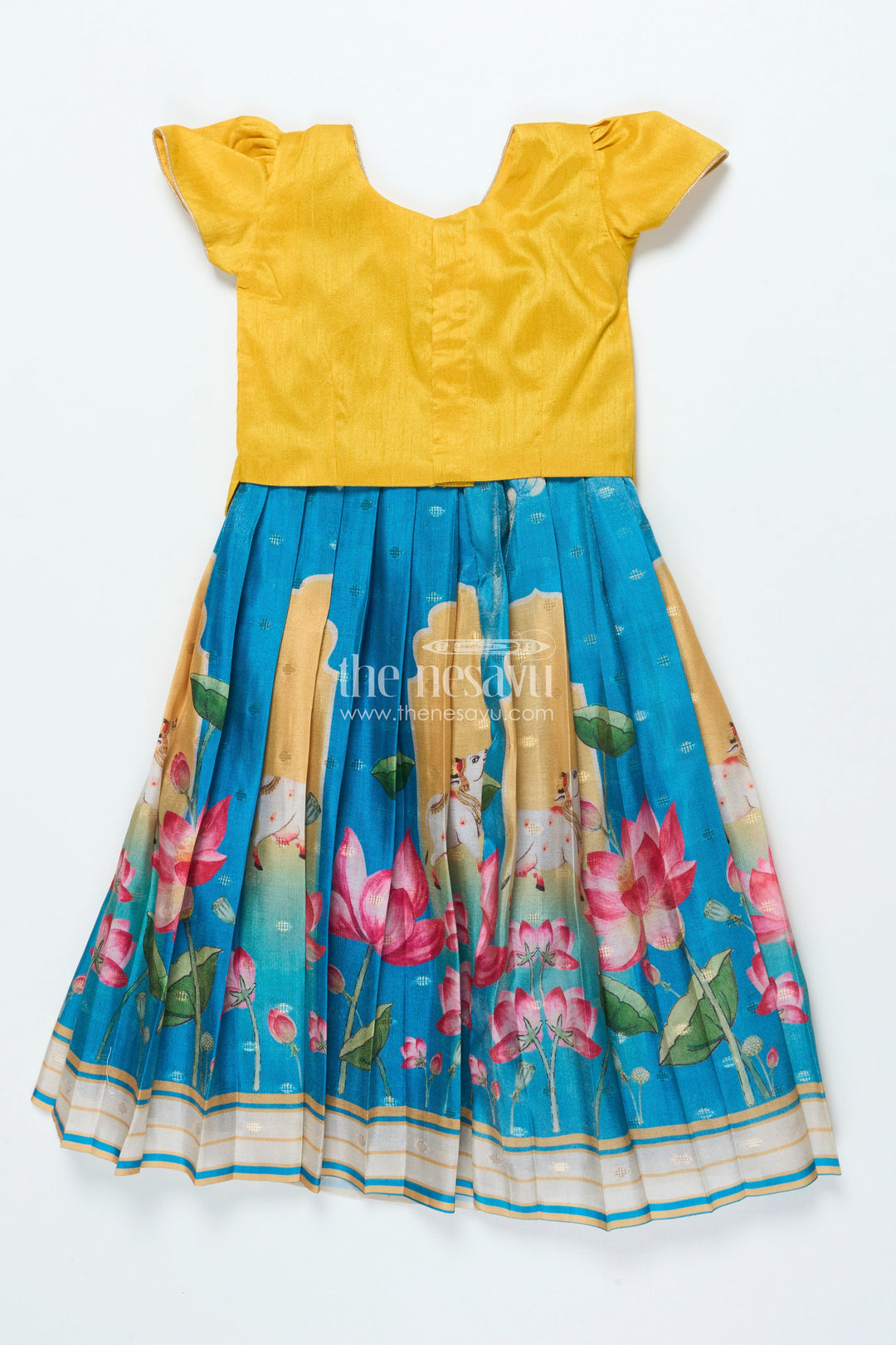 The Nesavu Pattu Pavadai Traditional Pattu Pavadai for Baby Girls for Temple and Cultural Events Nesavu Nesavu baby girl pattu pavadai Krishna print skirt scalloped sleeve blouse festive wear