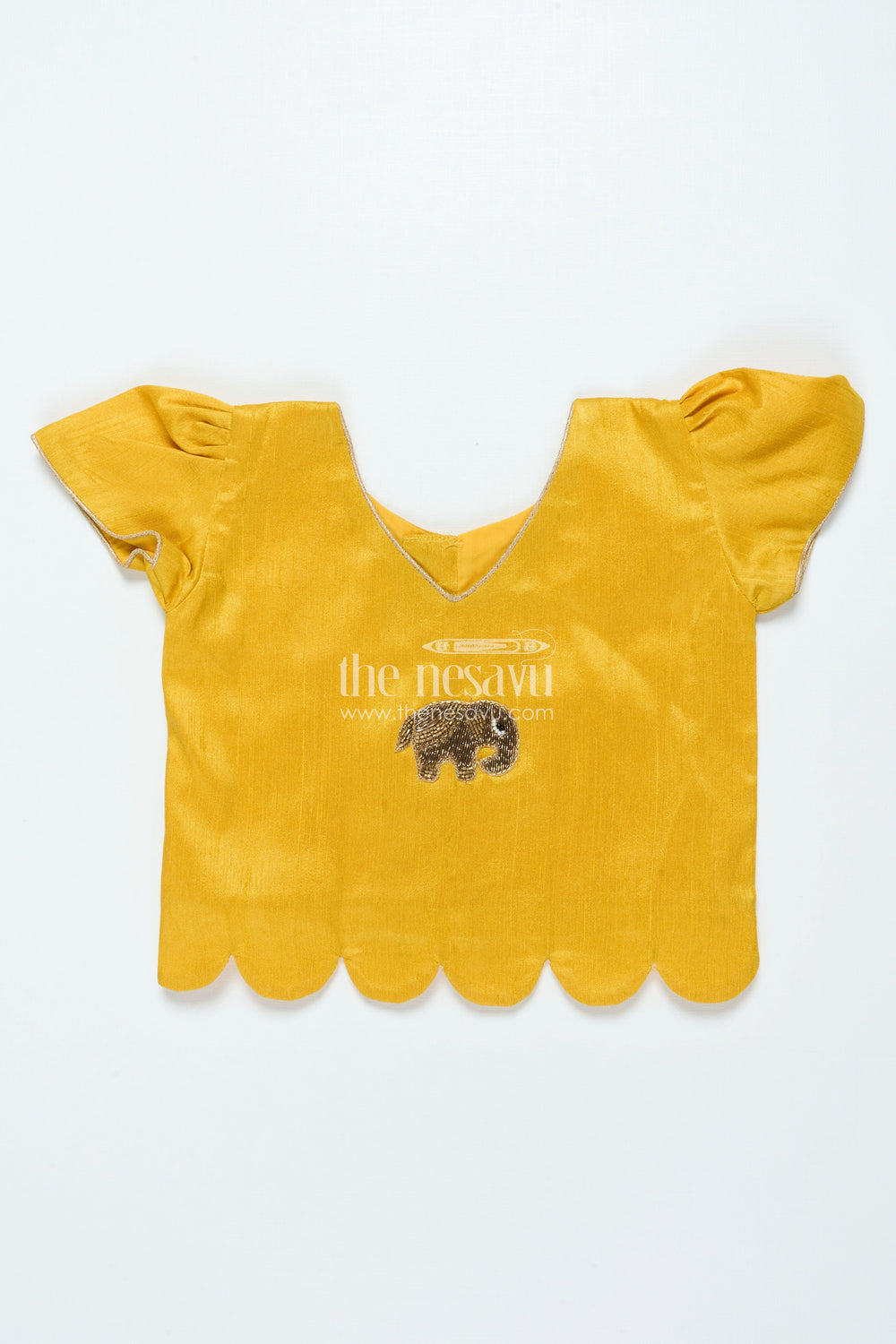 The Nesavu Pattu Pavadai Traditional Pattu Pavadai for Baby Girls for Temple and Cultural Events Nesavu Nesavu baby girl pattu pavadai Krishna print skirt scalloped sleeve blouse festive wear