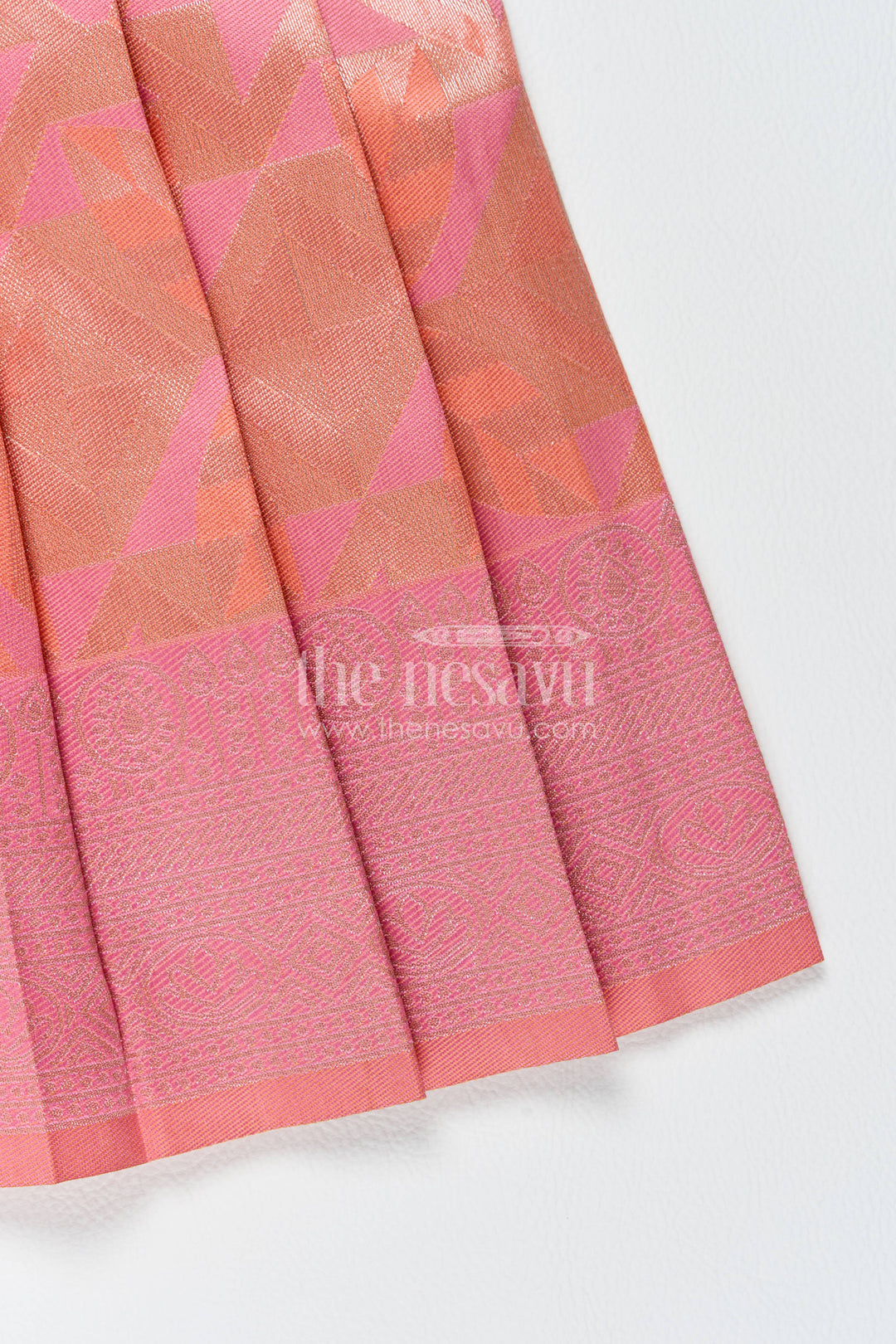 The Nesavu Girls Kanchi Silk Frock Traditional Silk Frock in Peach for Festive Gatherings Nesavu Nesavu Traditional Silk Frock In Peach For Festive Gatherings