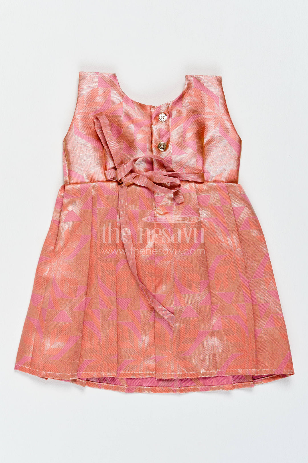 The Nesavu Girls Kanchi Silk Frock Traditional Silk Frock in Peach for Festive Gatherings Nesavu Nesavu Traditional Silk Frock In Peach For Festive Gatherings