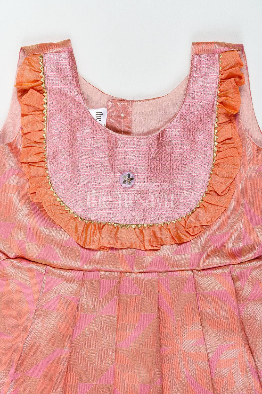 The Nesavu Girls Kanchi Silk Frock Traditional Silk Frock in Peach for Festive Gatherings Nesavu Nesavu Traditional Silk Frock In Peach For Festive Gatherings