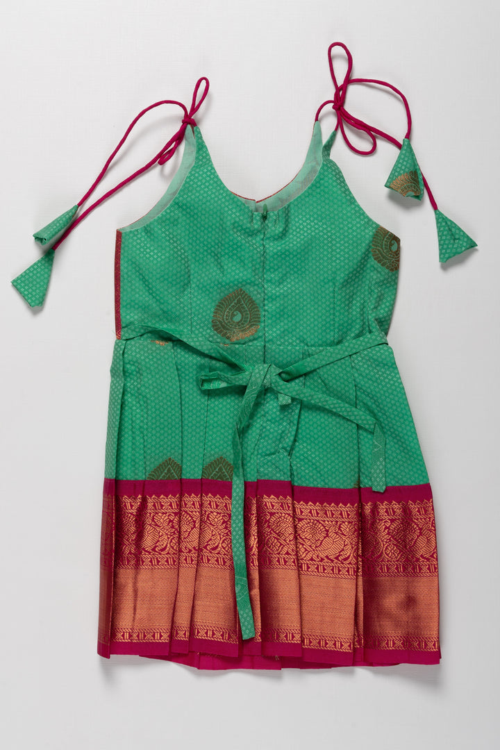 The Nesavu Tie-up Frock Traditional Silk Tie-Up Frock for Irubathiyettam and Namakaranam - Green and Maroon Nesavu Traditional Silk TieUp Frock for Girls Green and Maroon | Festive Wear | The Nesavu