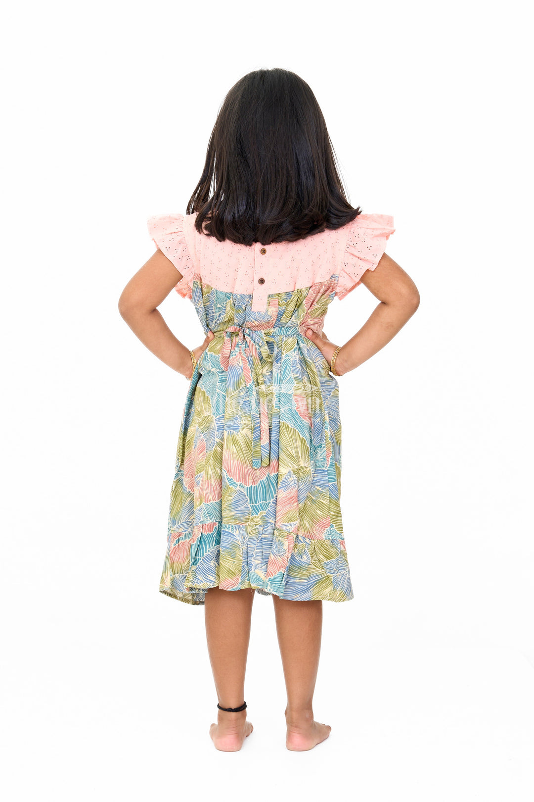 The Nesavu Girls Cotton Frock Trendy Girls Cotton New Dress with Vibrant Leaf Print and Lace Yoke Nesavu Girls Cotton New Dress Bold Leaf Print Flutter Sleeves Lace Detailing | The Nesavu