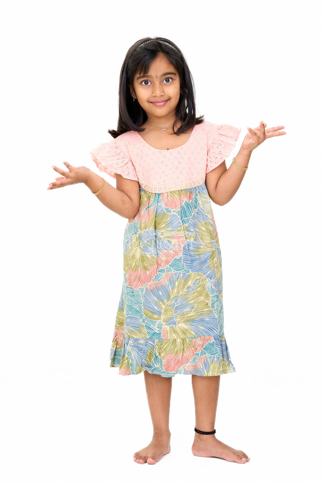 The Nesavu Girls Cotton Frock Trendy Girls Cotton New Dress with Vibrant Leaf Print and Lace Yoke Nesavu Girls Cotton New Dress Bold Leaf Print Flutter Sleeves Lace Detailing | The Nesavu