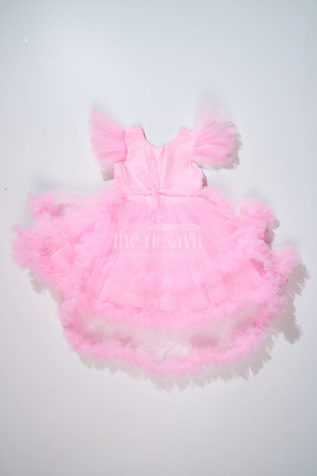 The Nesavu Girls Fancy Party Frock Trendy Pink Western Party Dress for Girls with Sequin Bow and High-Low Hem Nesavu Stylish Pink Western Party Dress Girls Sequin Bow High-Low Hem | The Nesavu