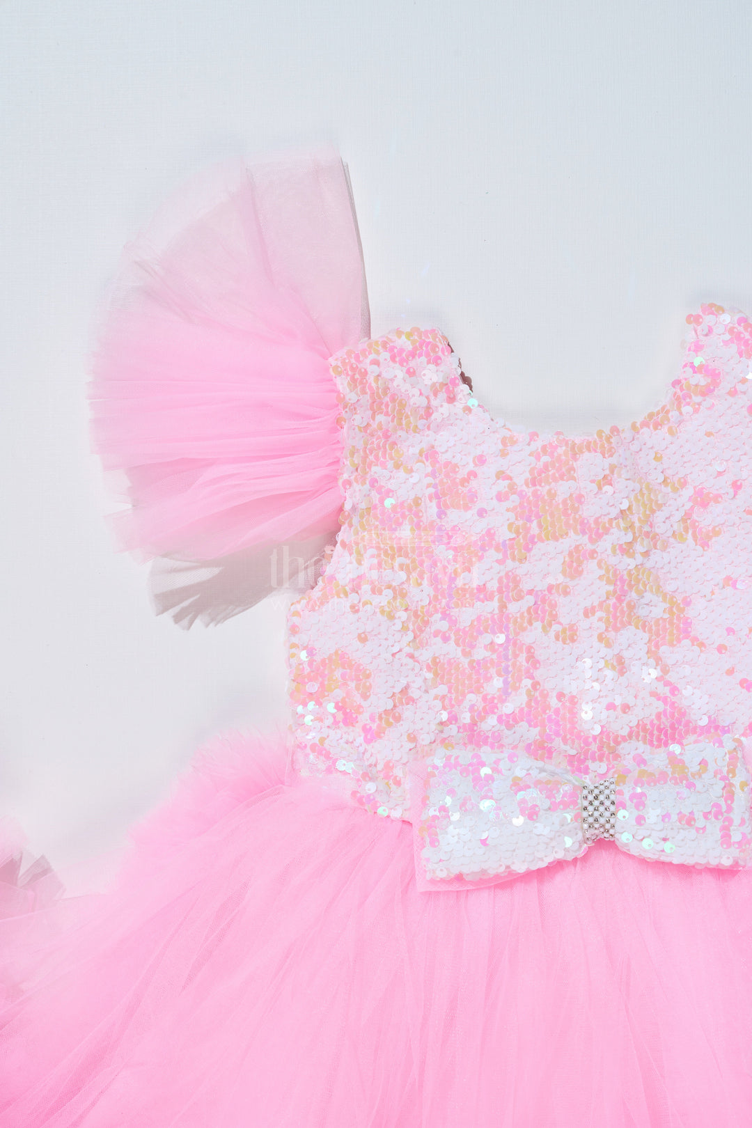 The Nesavu Girls Fancy Party Frock Trendy Pink Western Party Dress for Girls with Sequin Bow and High-Low Hem Nesavu Stylish Pink Western Party Dress Girls Sequin Bow High-Low Hem | The Nesavu