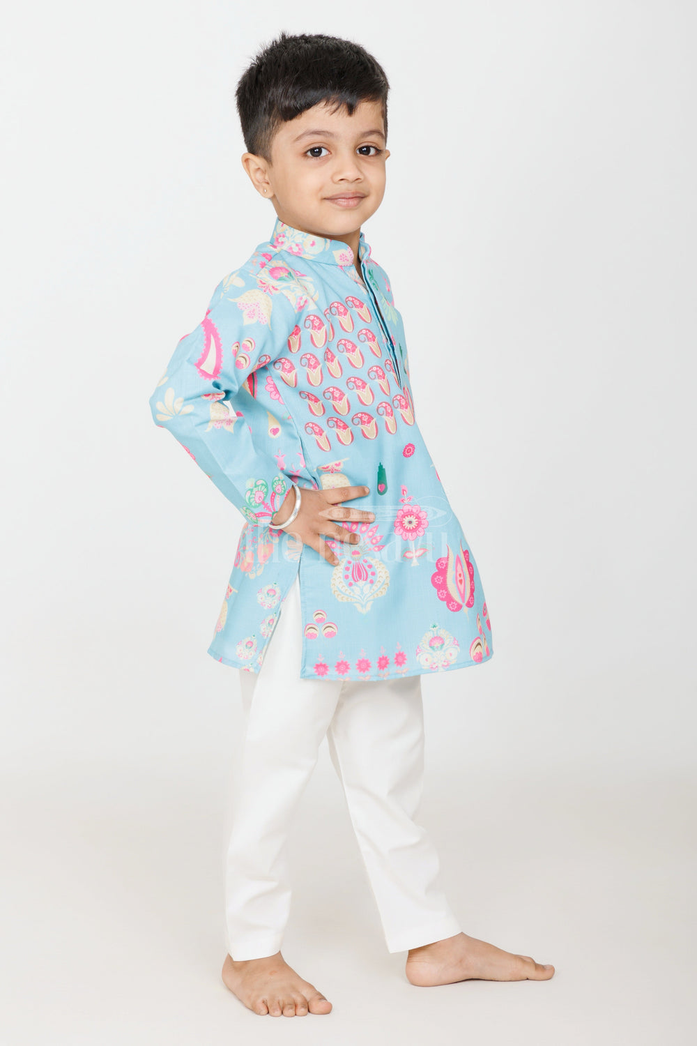 The Nesavu Boys Kurtha Set Turquoise Blended Silk Kurta Set for Boys with Floral and Paisley Prints for Traditional Events Nesavu Nesavu Boys Turquoise Silk Kurta Set Floral Paisley Prints Traditional Festive Wear