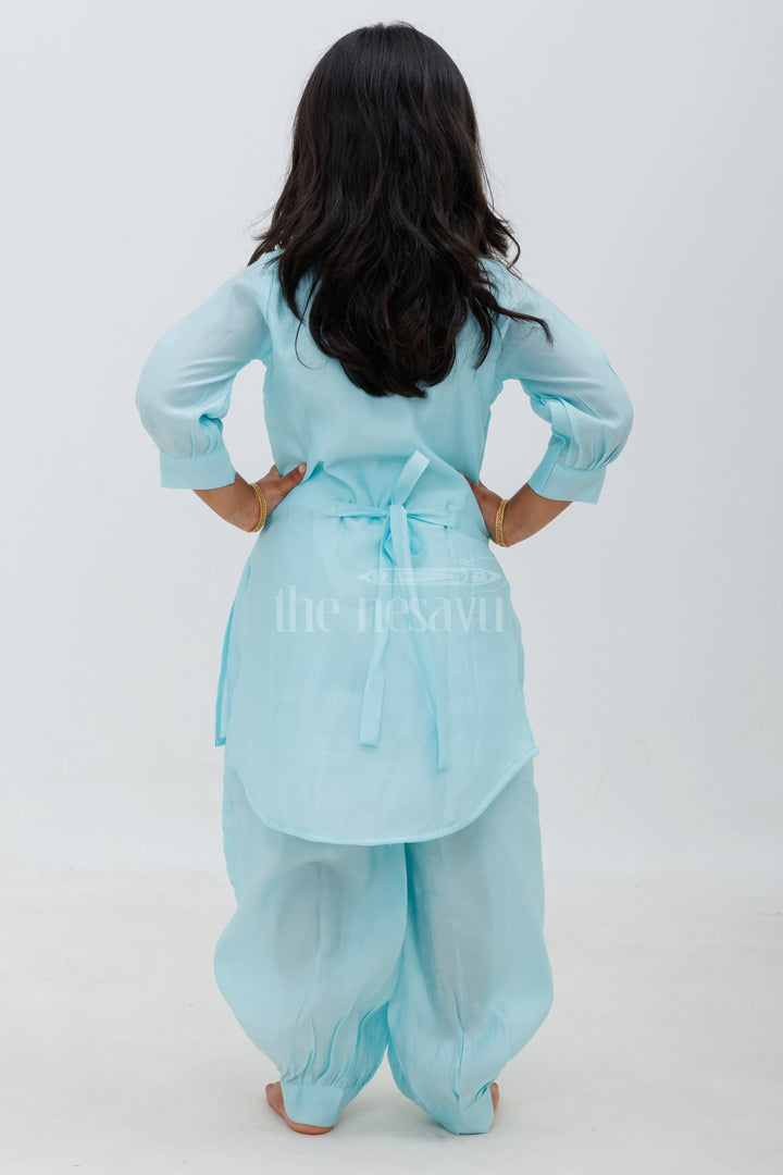 The Nesavu Girls Sharara / Plazo Set Turquoise Blue Elbow Sleeve Modal Silk Kurta Set with Floral Embroidery for Girls Nesavu Turquoise Blue 3/4th Sleeve Modal Silk Kurta Set for Girls