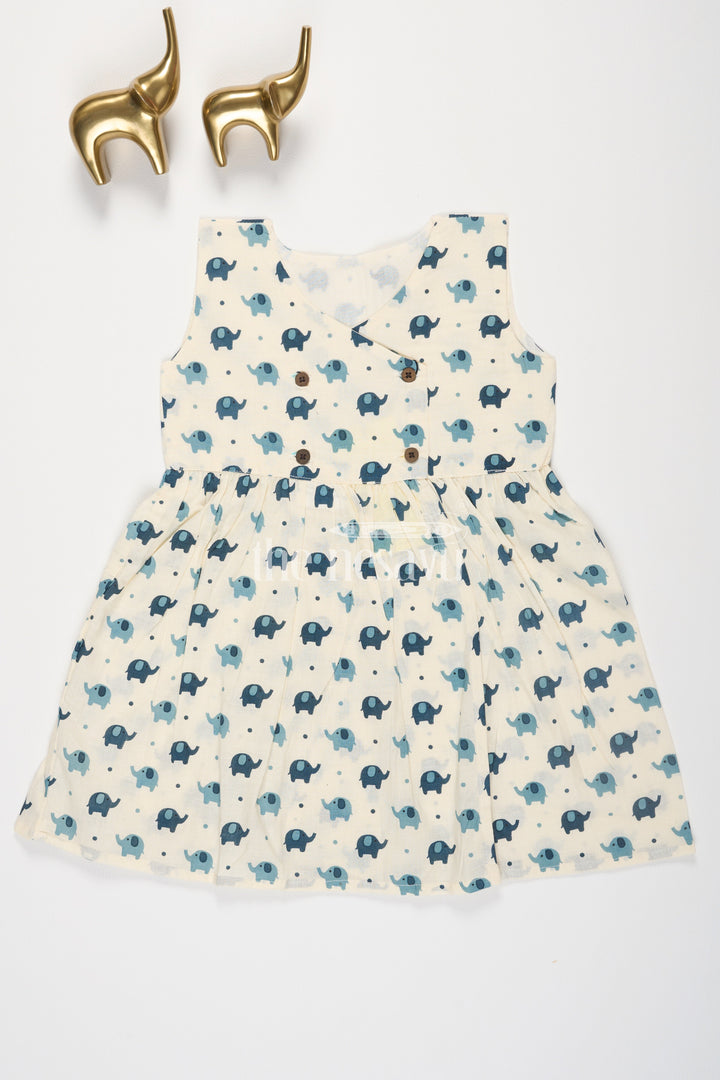 The Nesavu Baby Cotton Frocks Turquoise Elephant Motif Baby Cotton Frock with Mockwrap Neckline and Button Detail Nesavu 10 (NB) / Cream BFJ617D-10 Turquoise Elephant Motif Baby Cotton Frock with Mockwrap Neckline and Button Detail Nesavu