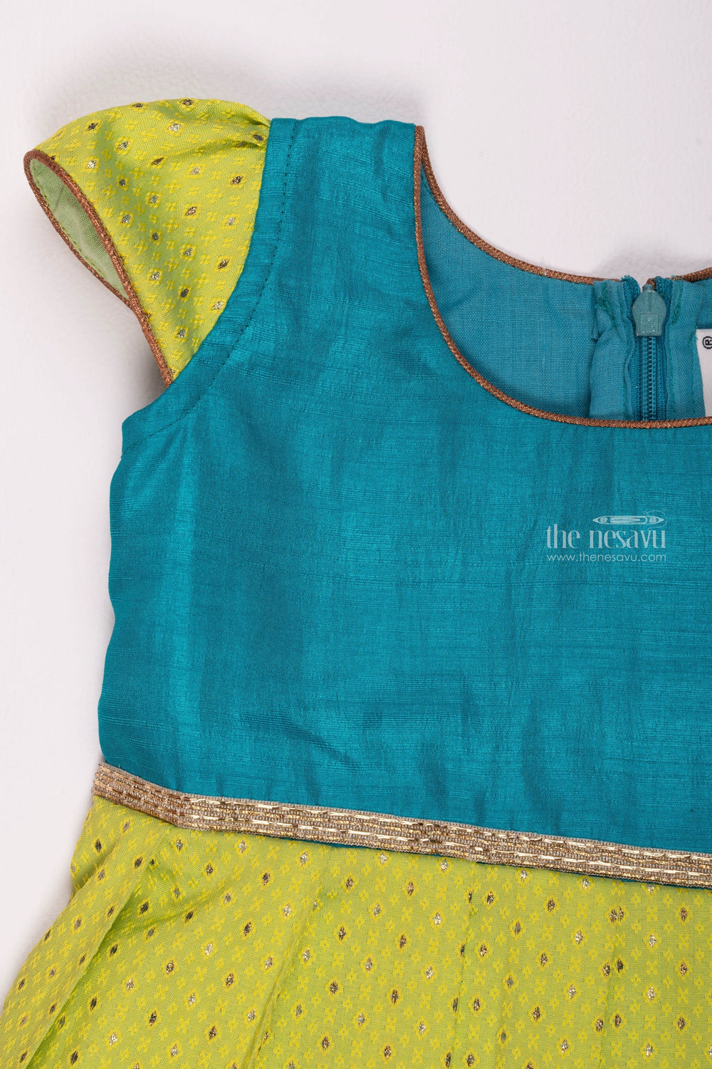 The Nesavu Silk Frock Verdant Green Zari-Embroidered Pleated Delight with Azure Blue Yoke: A Fusion of Elegance for Girls Nesavu Timeless Pattu Frocks | Handcrafted Silk Gowns for Girls | The Nesavu
