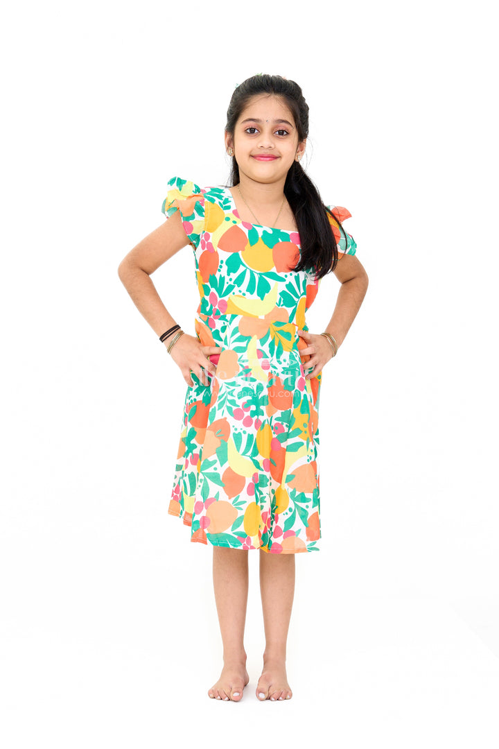 The Nesavu Girls Cotton Frock Vibrant Girls Cotton Ki Gown with Bold Fruit Print and Flutter Sleeves Nesavu 16 (1Y) / Multicolor GFC1555A-16 Girls Cotton Ki Gown Bright Fruit Print A-Line Design Flutter Sleeves | The Nesavu
