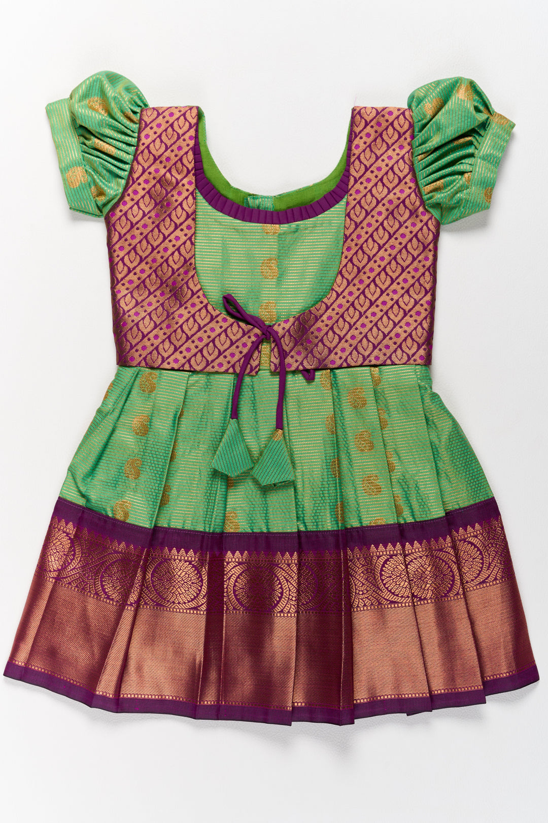 The Nesavu Girls Kanchi Silk Frock Vibrant Girls Kanchi Silk Frock in Green with Traditional Purple Borders for Pongal Fashion Nesavu 14 (6M) / Green / Style 1 SF858FA-14 Green Purple Girls Kanchi Silk Frock Pongal Nesavu