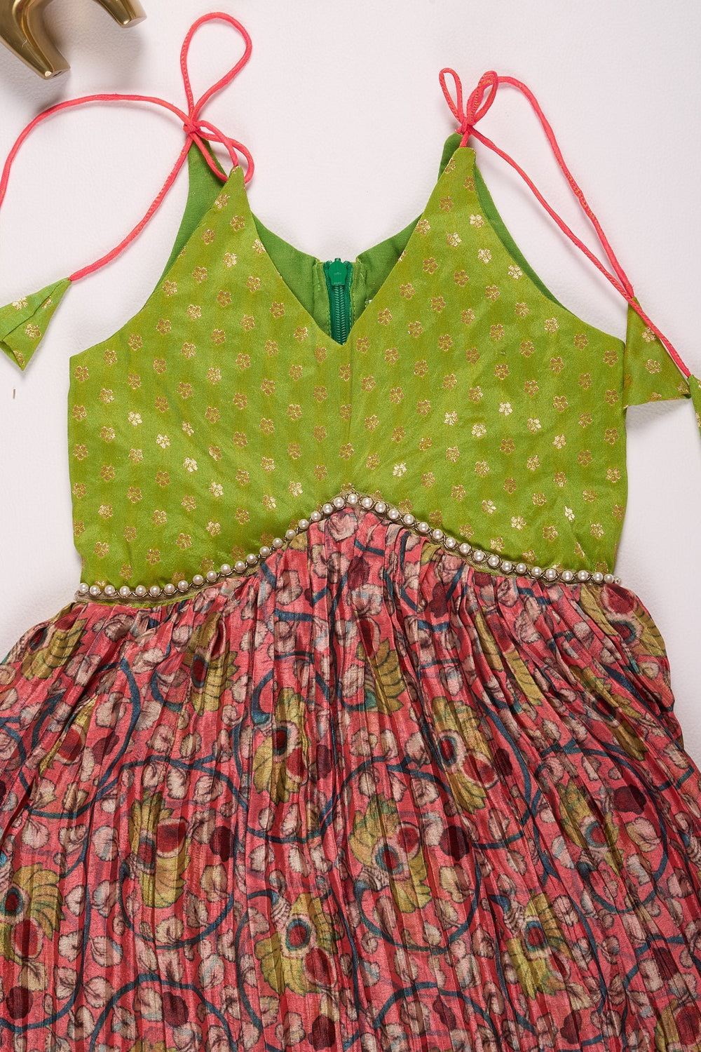 The Nesavu Tie-up Frock Vibrant Green and Floral Print Dress for Girls Nesavu Green and Maroon Pleated Chinon Designer Baby Frock with Tie-Up Straps - Elegant & Comfortable