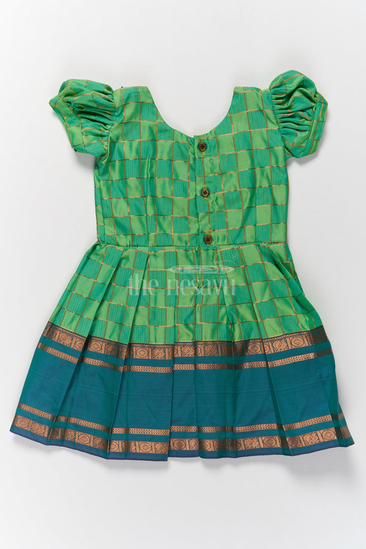 The Nesavu Girls Kanchi Silk Frock Vibrant Green Pattu Long Frock for Girls with Golden Checkered Pattern and Ruffled Yoke Nesavu Nesavus Green Pattu Long Frock Girls Golden Checkered Blend Silk Detailing