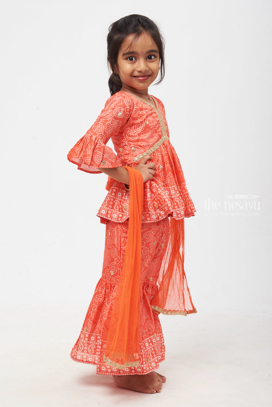 The Nesavu Girls Sharara / Plazo Set Vibrant Orange Alia Set: Bandhani Printed & Sequin Embroidered Kurti with Gharara - Indian Dresses for Trendy Girls Nesavu Girls Modern Kurti with Gharara Set Online | Printed Kurti Set for Girls | The Nesavu