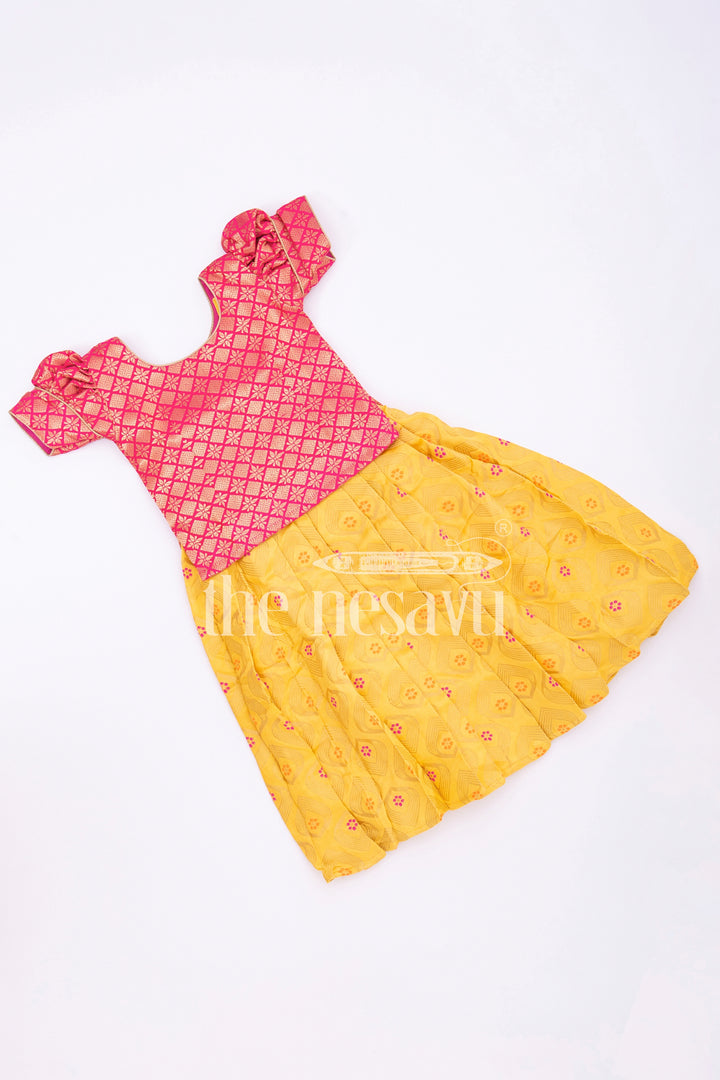 The Nesavu Pattu Pavadai Vibrant Pink and Yellow Silk Pattu Pavadai for Kids Nesavu Pink and Yellow Silk Pattu Pavadai for Kids - Festive Traditional Wear