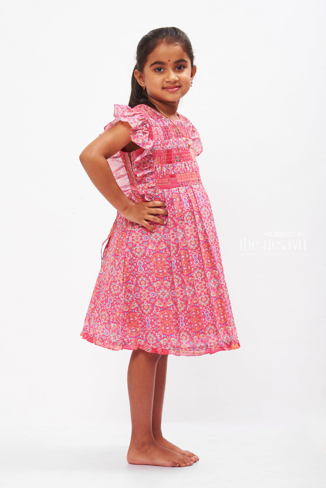 The Nesavu Girls Cotton Frock Vibrant Pink Smocked Cotton Frock for Girls with Traditional Print Nesavu Girls Summer Cotton Dress Essentials | Pink Smocked Frock | The Nesavu