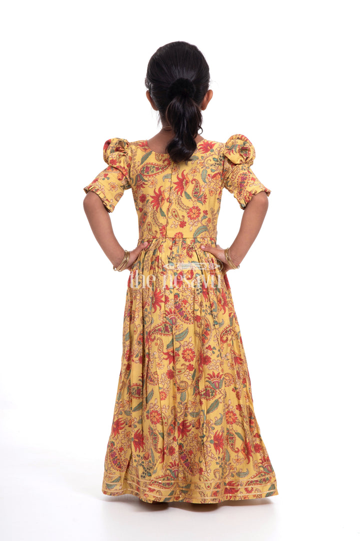 The Nesavu Girls Party Gown Vibrant Yellow Floral Muslin Silk Party Gown for Girls Nesavu Vibrant Yellow Floral Muslin Silk Party Gown for Girls - Elegant & Festive | The Nesavu