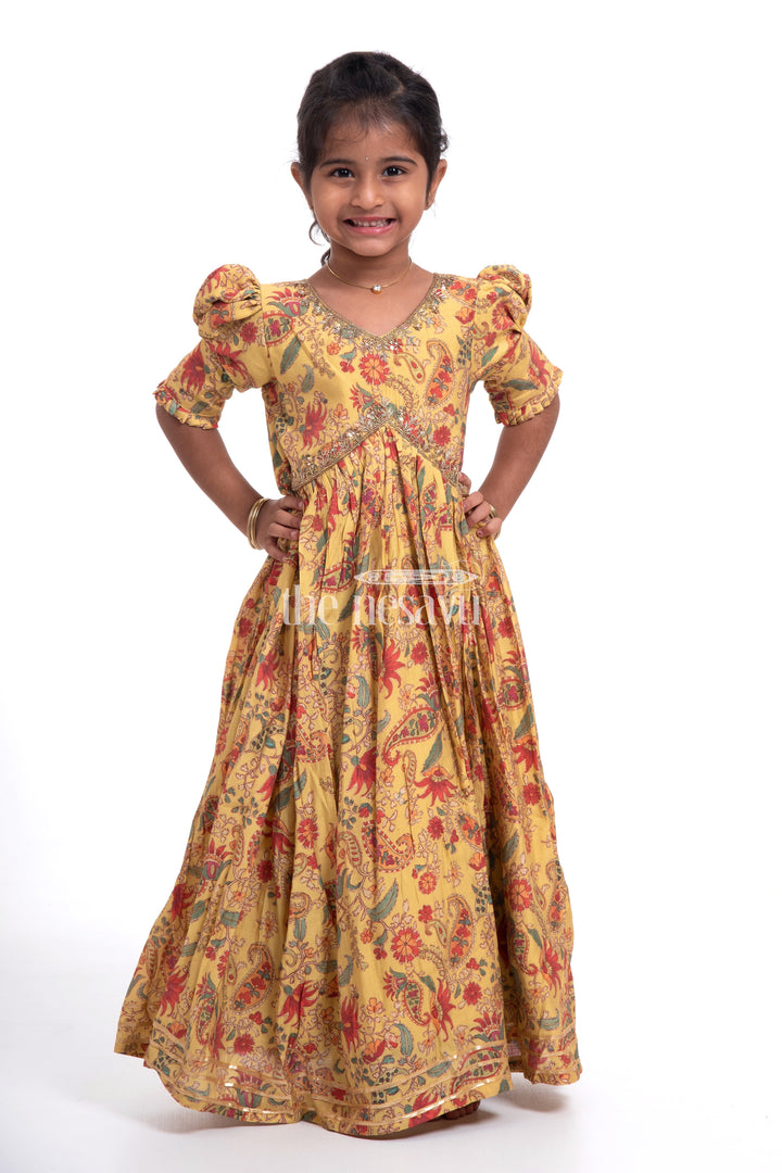 The Nesavu Girls Party Gown Vibrant Yellow Floral Muslin Silk Party Gown for Girls Nesavu Vibrant Yellow Floral Muslin Silk Party Gown for Girls - Elegant & Festive | The Nesavu