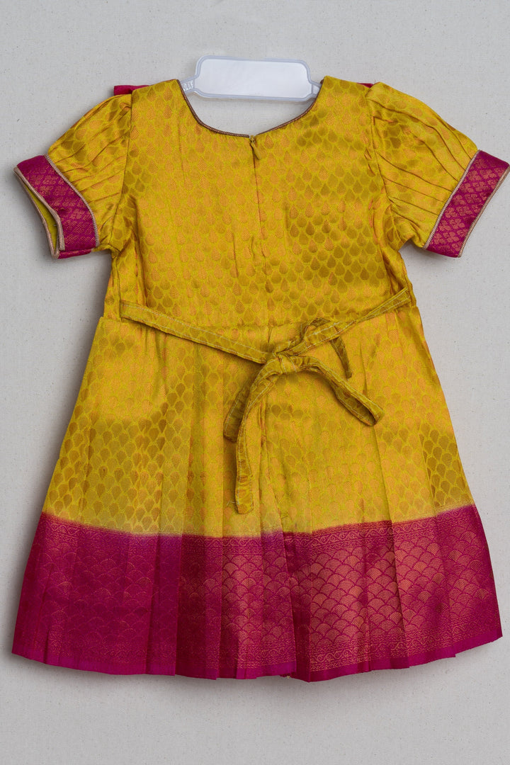 The Nesavu Girls Kanchi Silk Frock Vibrant Yellow Pink Banarasi Soft Silk / Pattu Frocks for Toddler Girl with Ruffle Yoke Nesavu Traditional Silk Wear Frock | The Nesavu