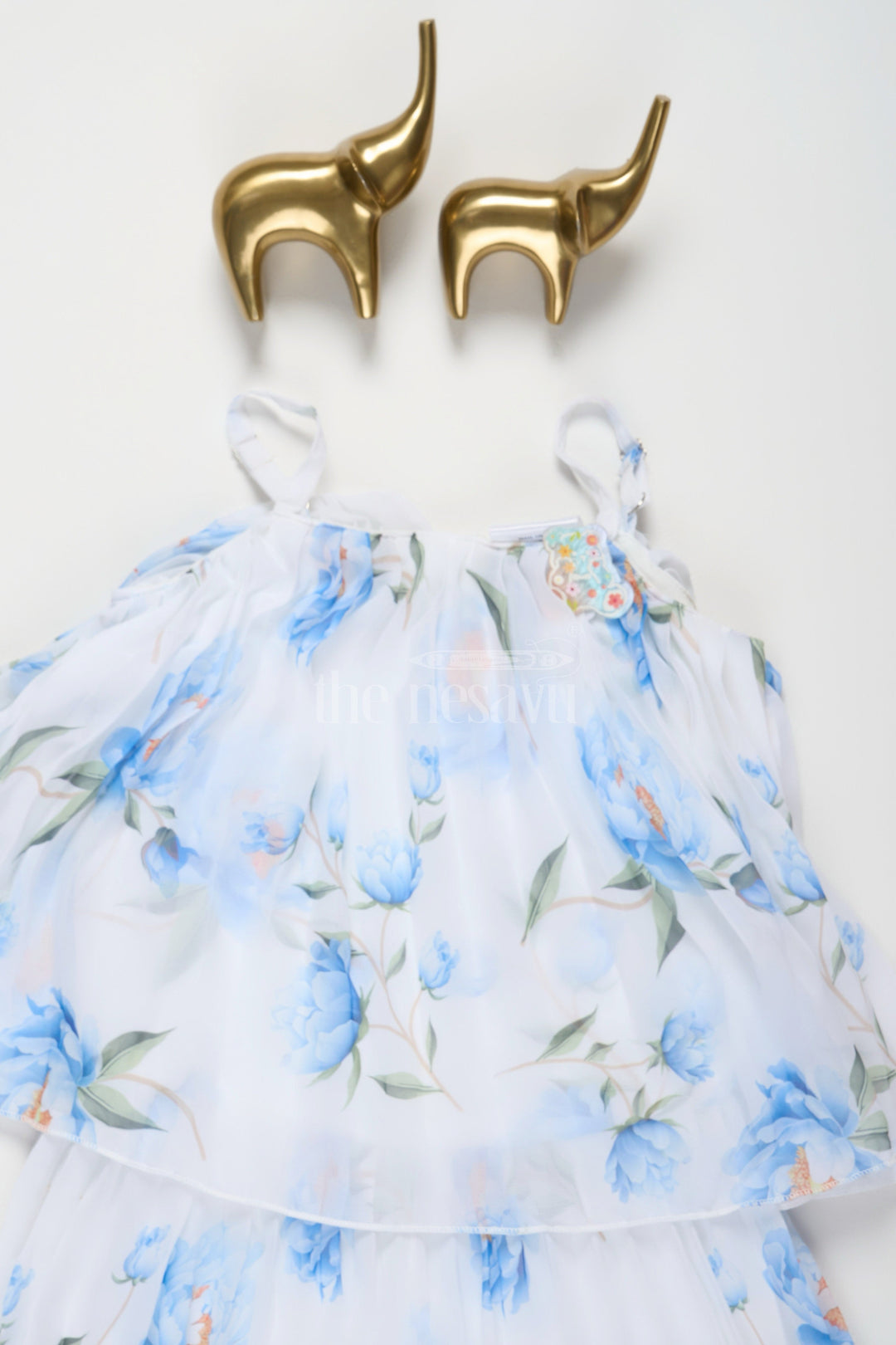 The Nesavu Girls Jumpsuit White and Blue Floral Girls Jumpsuit with Pleated Design and Adjustable Straps Nesavu Nesavu White Blue Floral Girls Jumpsuit Pleated Culottes Adjustable Straps