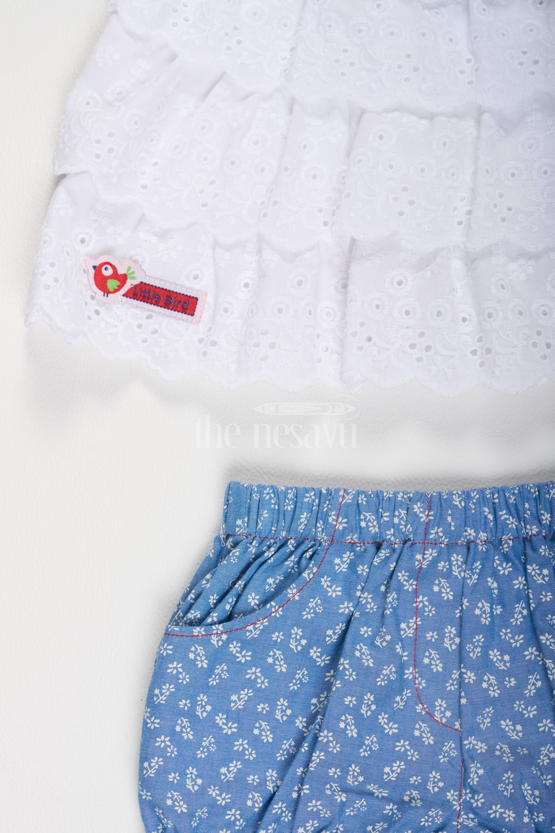 The Nesavu Baby Casual Sets White Chikankari Frock with Blue Floral Printed Bloomers Nesavu White Chikankari Frock with Blue Floral Bloomers - Nesavu